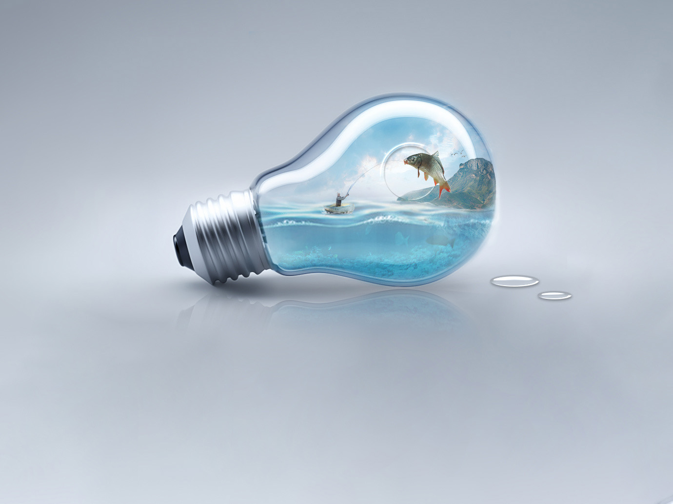 怎么用ps在灯泡里合成一幅钓鱼的情景图？