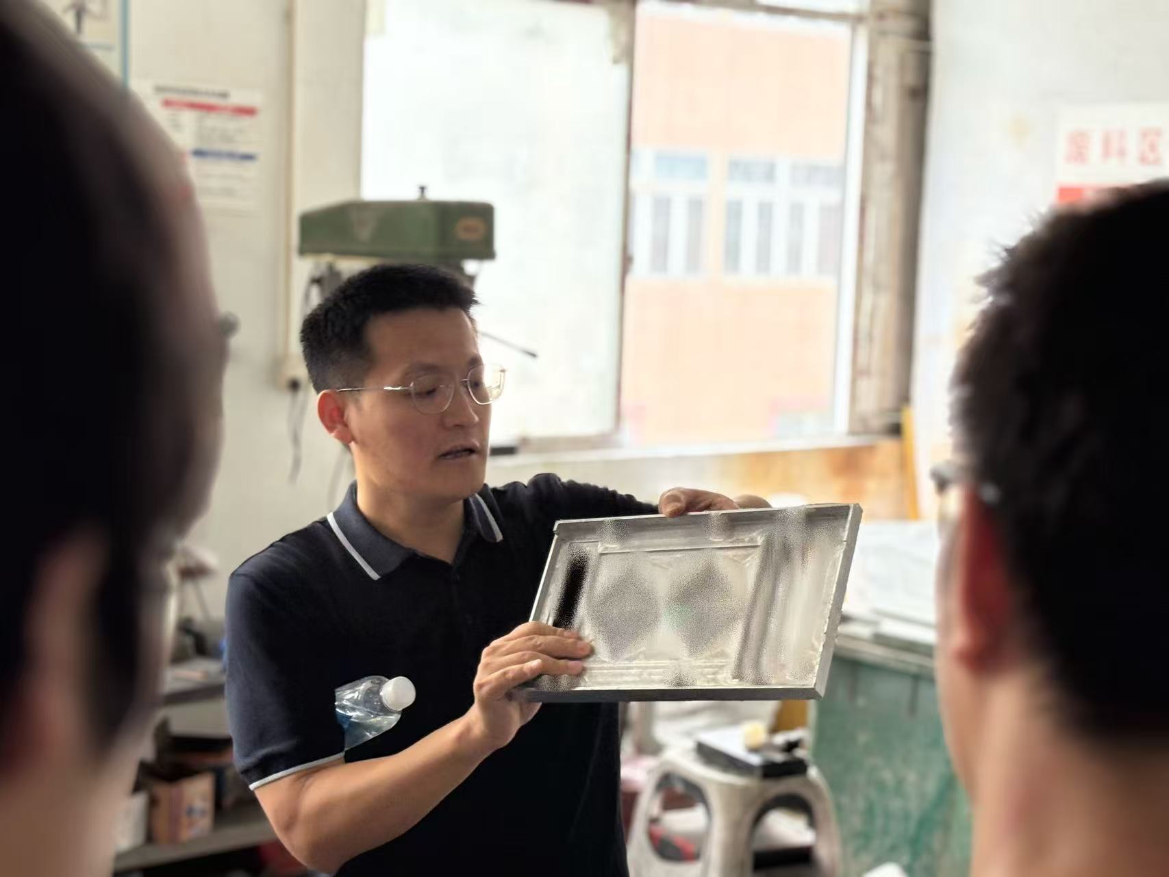 1765612969496553.jpg 考察现场杨老师手板模型讲解分享.jpg